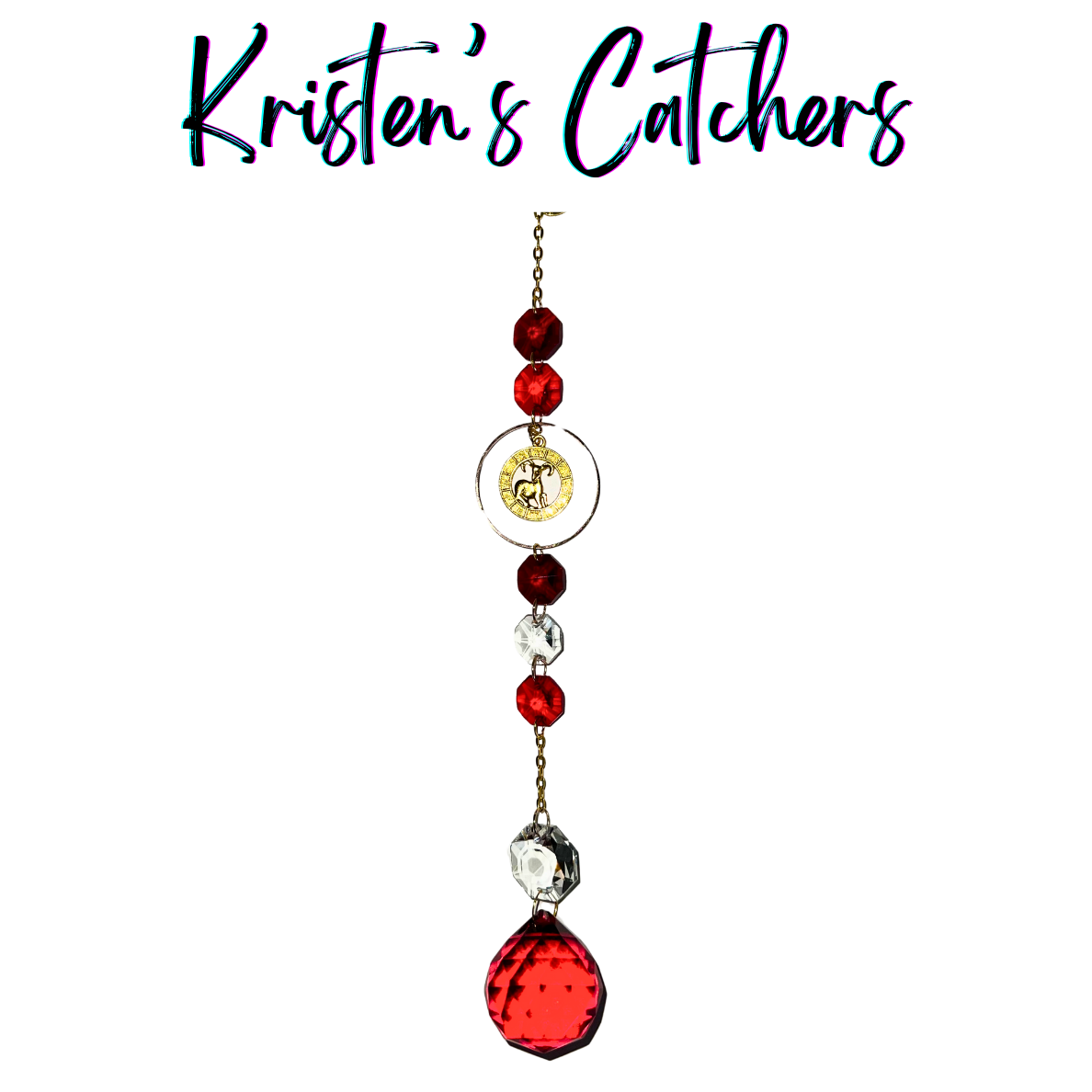Gold Aries sun catcher with red crystal accents and clear prisms creating dancing light patterns