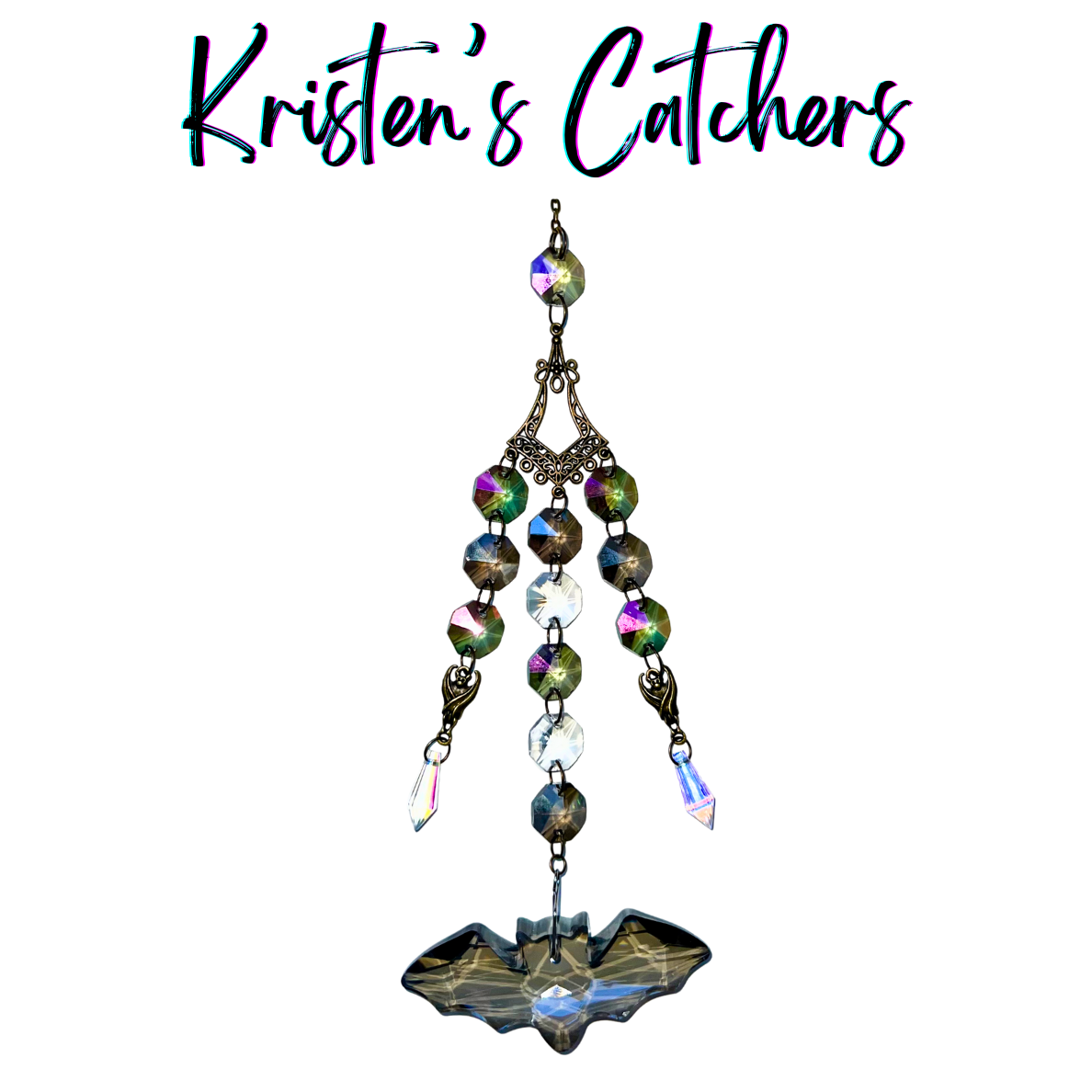 Elegant Bat Silhouette Sun Catcher with bronze filigree connector, iridescent octagonal prisms, and smoky bat-shaped crystal pendant hanging against white background
