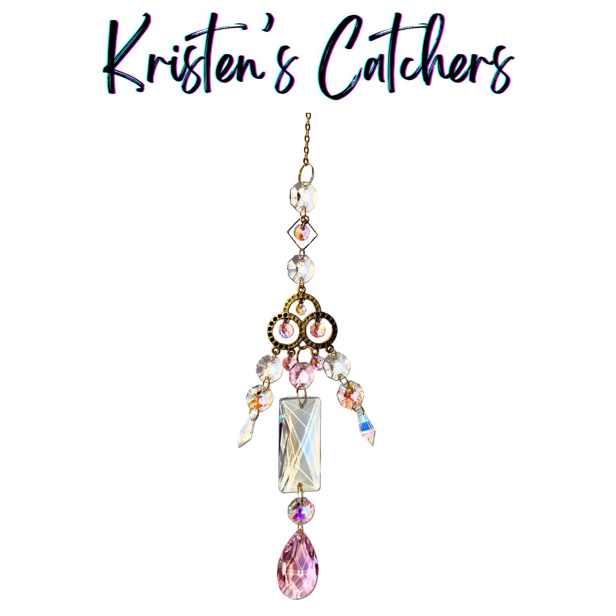 Princess-style sun catcher with ornate gold centerpiece, pink and clear prisms, and pink teardrop finale hanging against white background