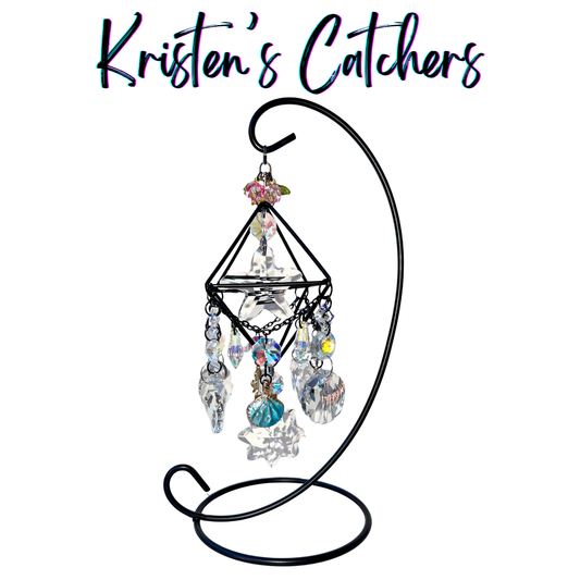 Hawaiian waters desk catcher with black geometric frame, ocean blue crystals, black hibiscus charms and display stand