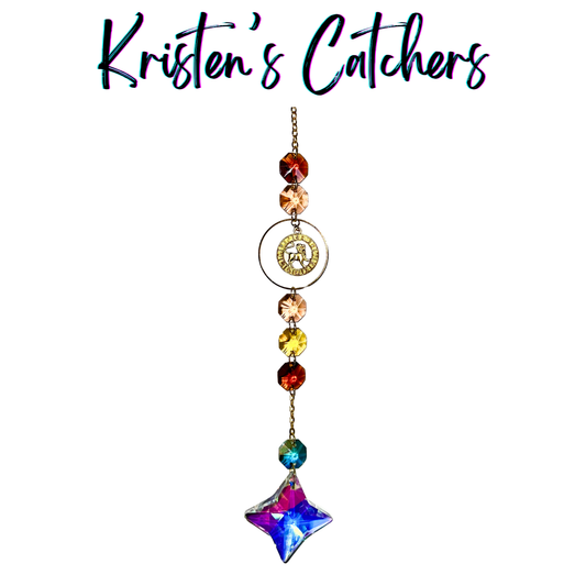 Silver Leo sun catcher with amber crystals and iridescent star crystal creating dramatic light patterns