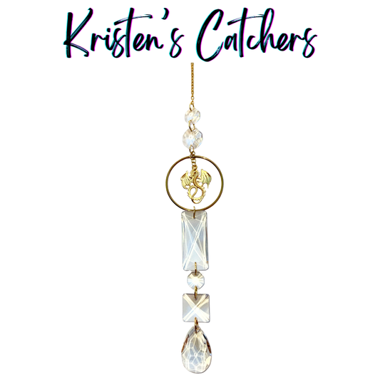 Handcrafted single strand sun catcher with gold dragon charm, bronze ring connector, large lattice-cut rectangular and square crystal prisms, and a champagne teardrop pendant drop.