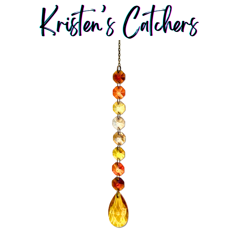 Handcrafted single strand warm gradient sun catcher with bronze hardware flowing from burnt orange through amber and champagne to a rich amber-gold teardrop pendant drop.