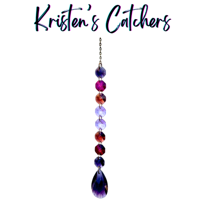 Handcrafted single strand purple gradient sun catcher with bronze hardware flowing from deep indigo through magenta and lavender to a dark amethyst teardrop pendant drop.