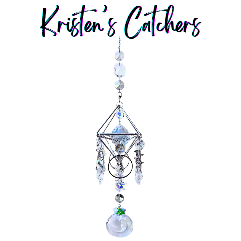 Handcrafted Artemis II-inspired 3D silver geometric sun catcher with four crescent moon charms, astronaut figure, clear spear crystal drops, and a moon-shaped opalescent pendant drop.