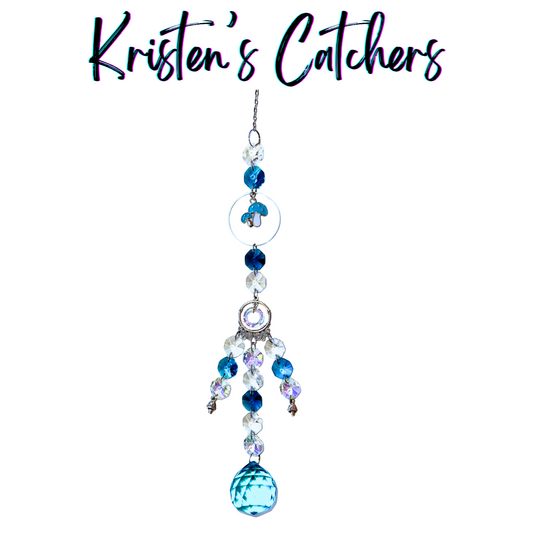Enchanted Blue Mushroom Grove Sun Catcher with sky blue mushroom charm, silver mushroom accents, and cascading blue crystal strands