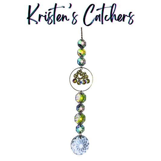 Lavender Storm Sun Catcher with iridescent crystals and circular storm-inspired design