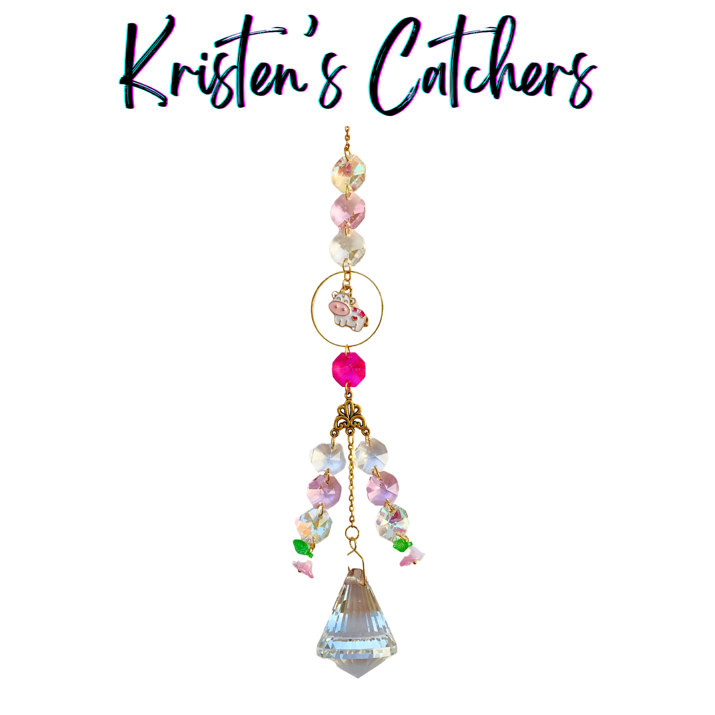 Pastel crystal sun catcher with pink cow charm and gold-toned accents