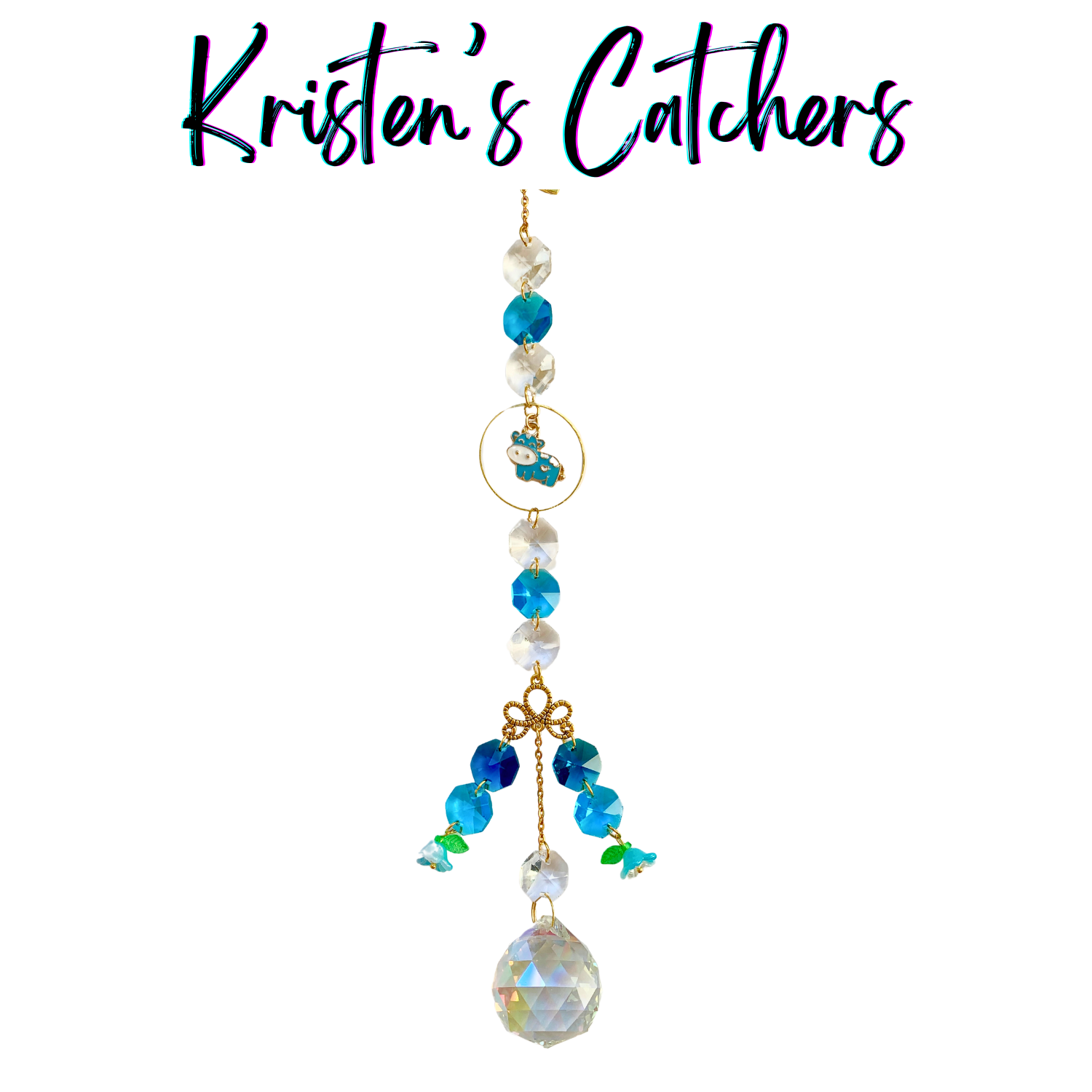 Blue and clear crystal sun catcher with cow charm and gold-toned accents