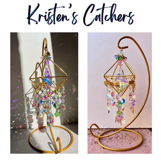 Blooming Garden Desk Catcher with geometric gold frame featuring four flower crystals in green, purple, blue, and pink with included stand