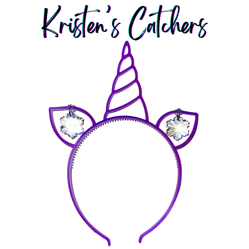 Neon purple glow-in-the-dark unicorn headband sun catcher with spiral horn and a clear snowflake-shaped crystal in each ear