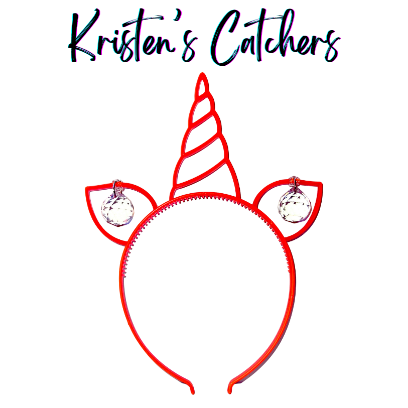 Neon red glow-in-the-dark unicorn headband sun catcher with spiral horn, two pointed ears, and a clear faceted crystal ball drop in each ear