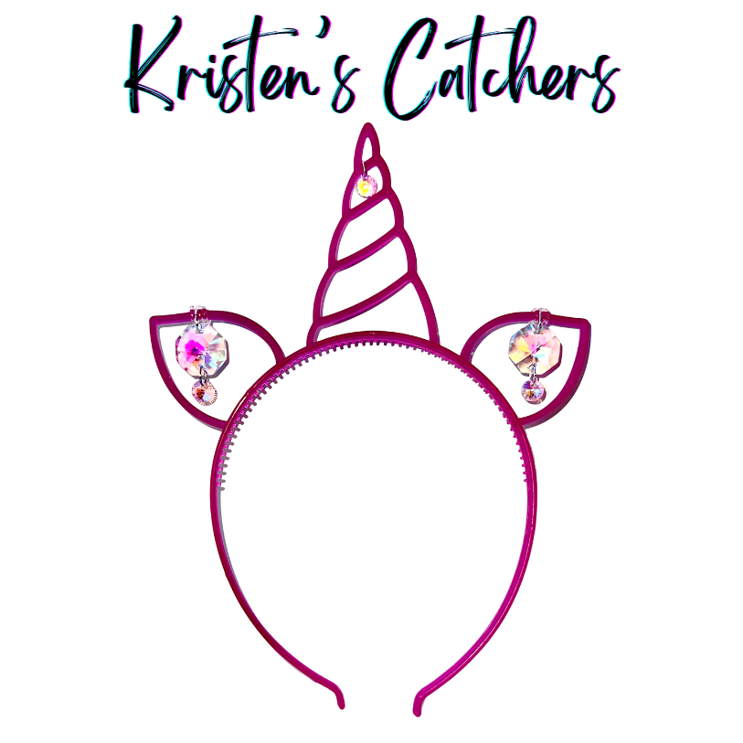 Glow-in-the-dark magenta unicorn headband sun catcher adorned with pink and gold iridescent A/B crystals, small clear accent drops in each ear, and a crystal on the horn tip