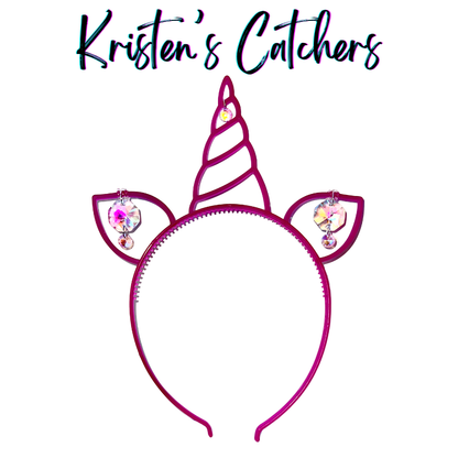 Glow-in-the-dark magenta unicorn headband sun catcher adorned with pink and gold iridescent A/B crystals, small clear accent drops in each ear, and a crystal on the horn tip