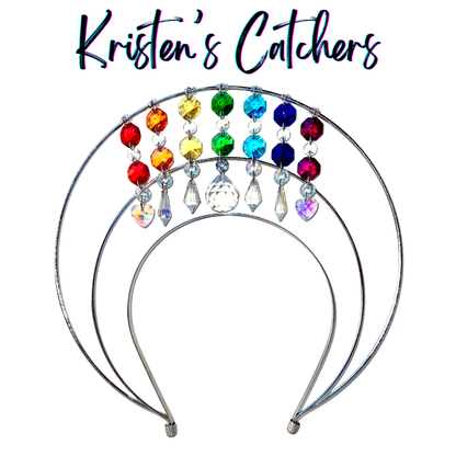 Double layer silver wire halo goddess crown hand-adorned with full rainbow colored octagon crystals, iridescent A/B heart shaped crystals on the outer row, clear drops, and a clear faceted ball center drop