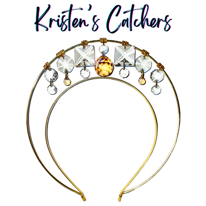Single layer gold wire halo goddess crown hand-adorned with large clear square crystal prisms, champagne faceted ball center stone, clear octagon drops, and champagne accent crystals