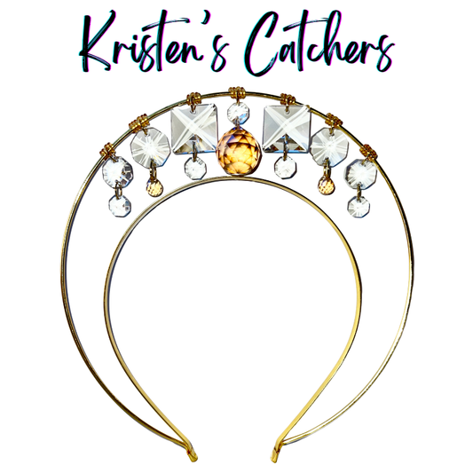 Single layer gold wire halo goddess crown hand-adorned with large clear square crystal prisms, champagne faceted ball center stone, clear octagon drops, and champagne accent crystals