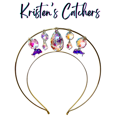 Single layer gold wire halo goddess crown hand-adorned with purple dolphin shaped crystals, iridescent A/B teardrop center stone, octagon, rivoli, and candy shaped A/B crystals