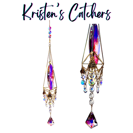 Sultry boudoir sun catcher with elongated purple crystal centerpiece, geometric gold frame, and cascading multi-strand design against white background