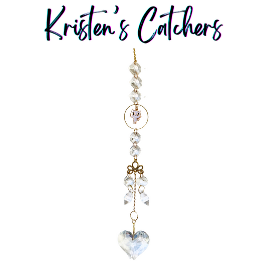 Handcrafted white cat crystal sun catcher with clear beads, golden accents, and heart pendant, made in Venice Beach