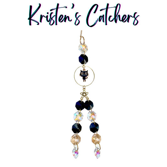 Black and clear crystal sun catcher with black cat charm and alternating crystal drops