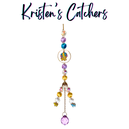 Handcrafted multicolor crystal sun catcher with clown kitty charm, vibrant beads, and playful cat accents, made in Venice Beach