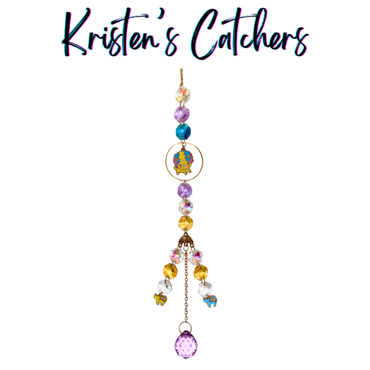 Handcrafted multicolor crystal sun catcher with clown kitty charm, vibrant beads, and playful cat accents, made in Las Vegas