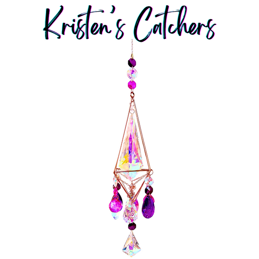 Rose gold 3D geometric sun catcher with triangular frame featuring extra-large A/B center crystal and cascading purple magenta prism party