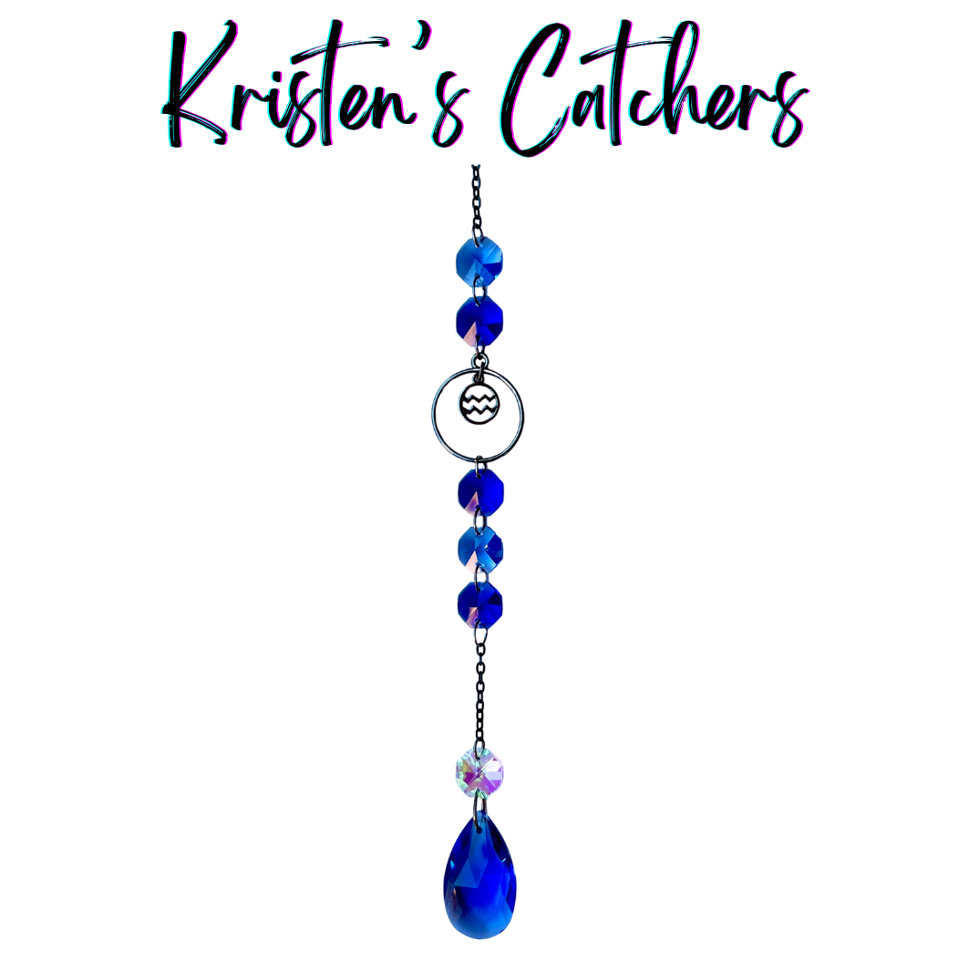 Aquarius zodiac sun catcher with gunmetal water bearer symbol centerpiece featuring electric blue crystals with black chain
