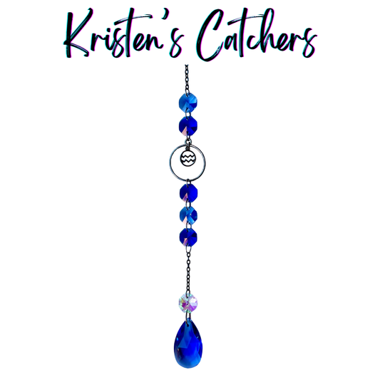 Aquarius zodiac sun catcher with gunmetal water bearer symbol centerpiece featuring electric blue crystals with black chain