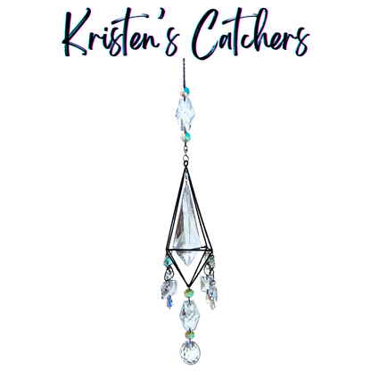 One of a kind clear crystal sun catcher with iridescent orange-teal accent beads, elongated cube frame
