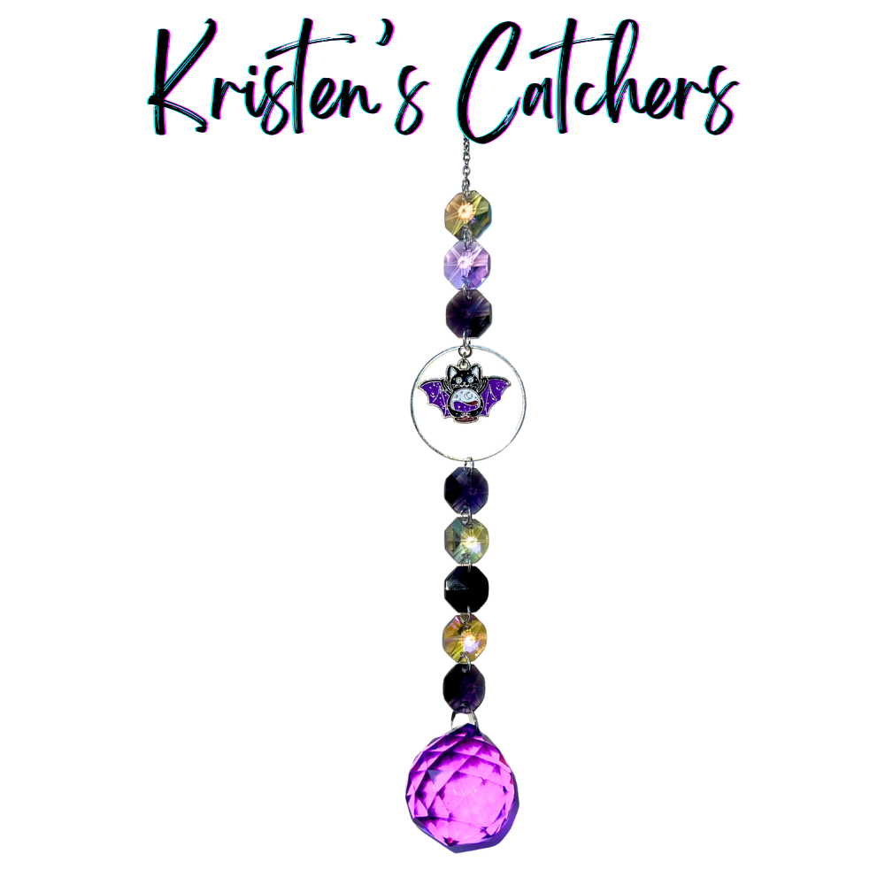 Halloween Bat-Kitty Hybrid Sun Catcher with lavender, violet, and gray crystals, featuring a large purple crystal ball