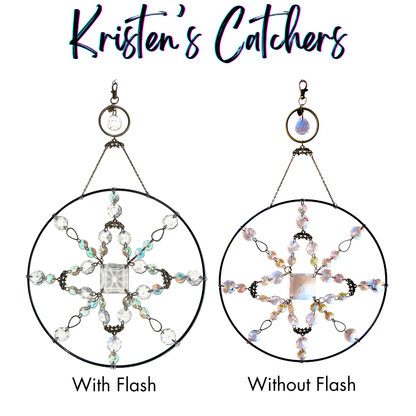 Black ring mandala sun catcher with red to teal color-changing glass beads