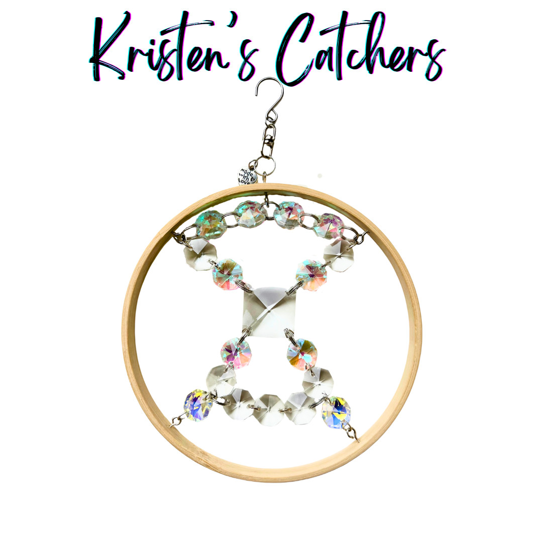 X-Files inspired crystal suncatcher with wooden ring frame