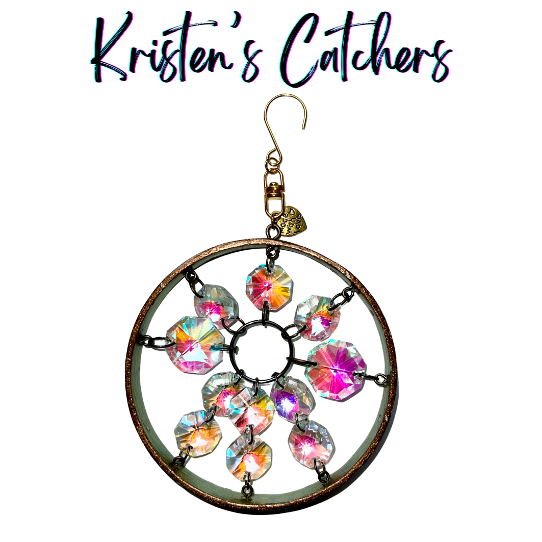 Abstract spiral sun catcher with aurora borealis crystals and color-shifting frame