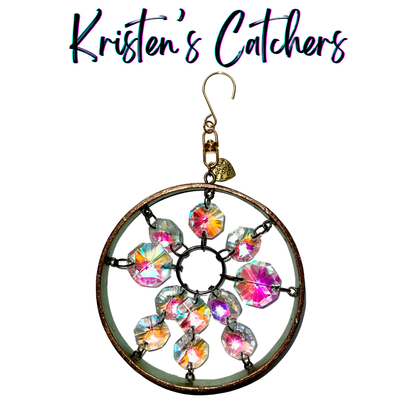 Abstract spiral sun catcher with aurora borealis crystals and color-shifting frame