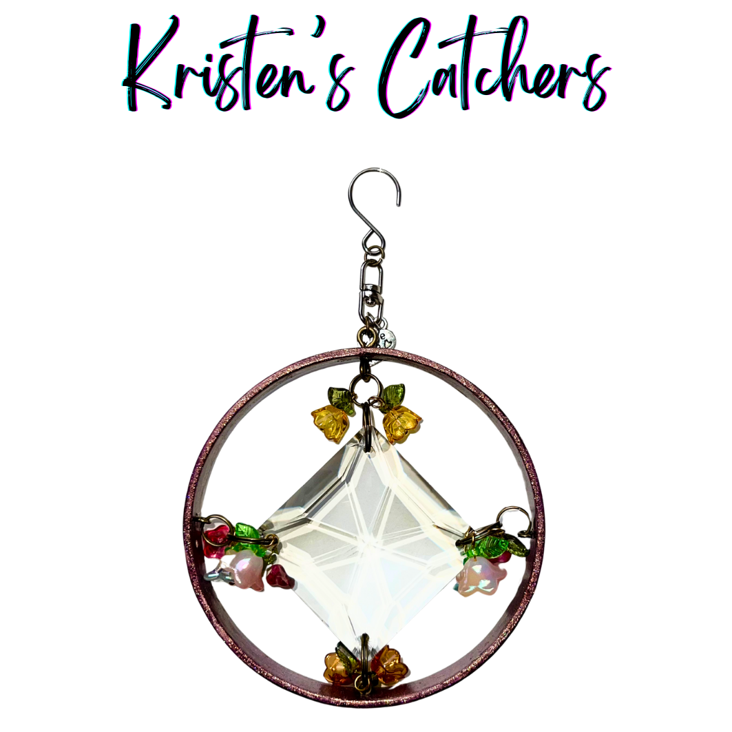 Square crystal suncatcher with flower accents and purple-gold frame