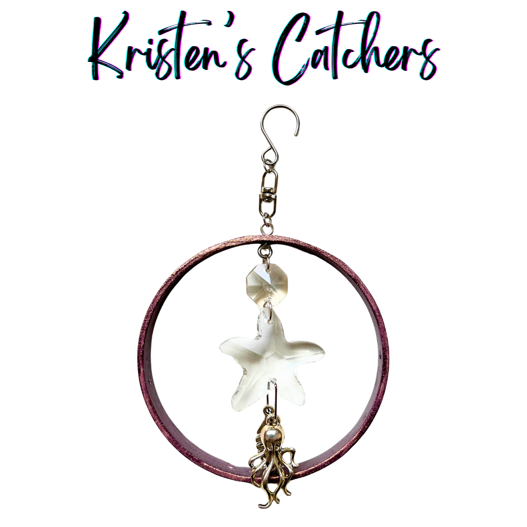 Starfish crystal suncatcher with sea creature charms and purple-gold frame