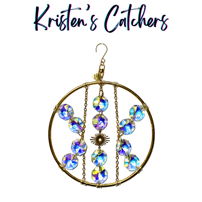 Arcane eye suncatcher with aurora borealis crystals and brass frame