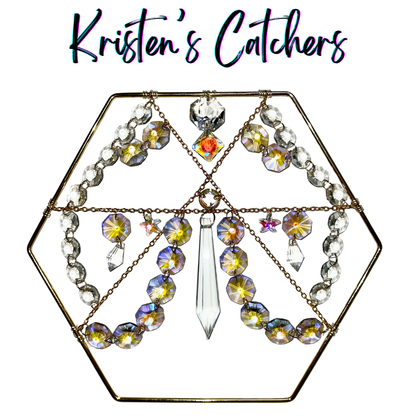 Hexagonal tabletop sun catcher with spear centerpiece and aurora borealis crystals