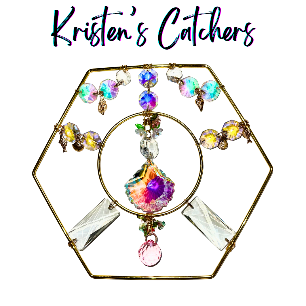 Hexagonal tabletop sun catcher with rotating seashell crystal and golden ocean charms