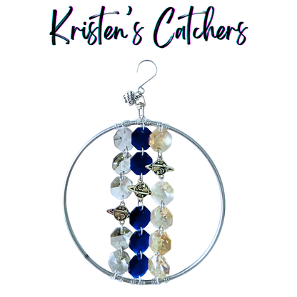Planetary orbit ornamental sun catcher with 4-inch wire-wrapped ring, Saturn charms and blue champagne crystals in three cascading strands