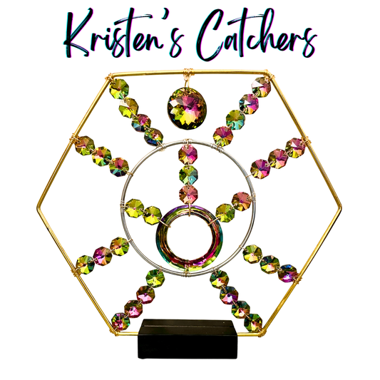 Viridian bloom hexagon sparkle decor with metallic-backed red-to-green shifting crystals in golden hexagon frame with display stand