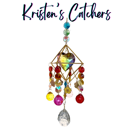 Handmade flower child crystal sun catcher with floral charms, colorful pastel beads, and iridescent pendant drop Las Vegas