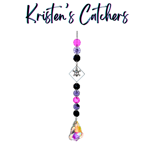 Handmade goth core crystal sun catcher with black and dark purple beads, bat charms, and iridescent dark pendant Las Vegas