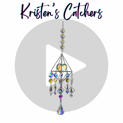 Geometric Glitz sun catcher with clear and colorful crystals in a geometric frame. 