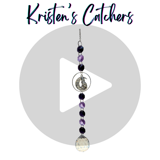 light purple and dark violet single strand sun catcher with large silver wolf and moon pendant