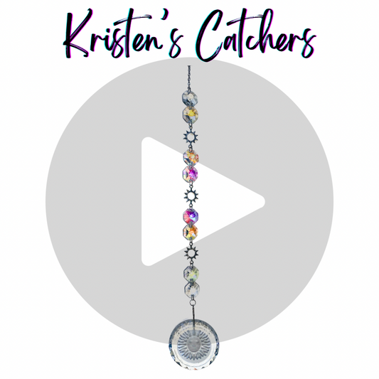 Sunburst Serenity sun catcher with colorful crystals and sun-themed charms