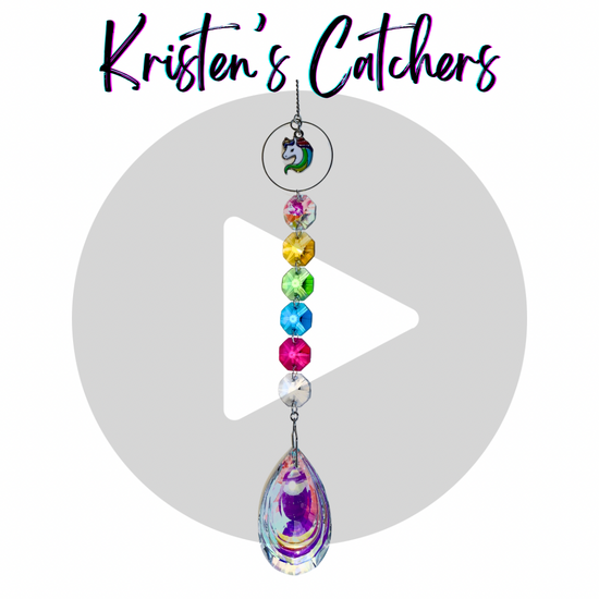 Unicorn Sparkle sun catcher with rainbow-colored crystals and a unicorn charm