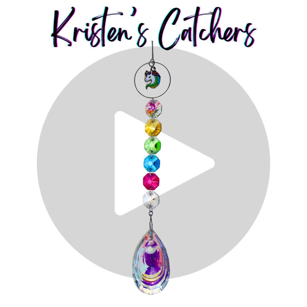 Unicorn Sparkle sun catcher with rainbow-colored crystals and a unicorn charm